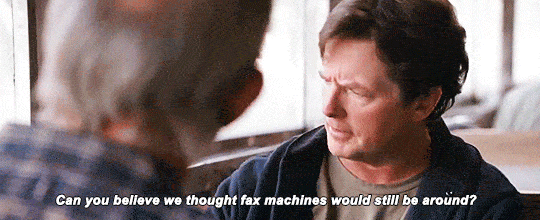 guy talking about how fax machines are outdated